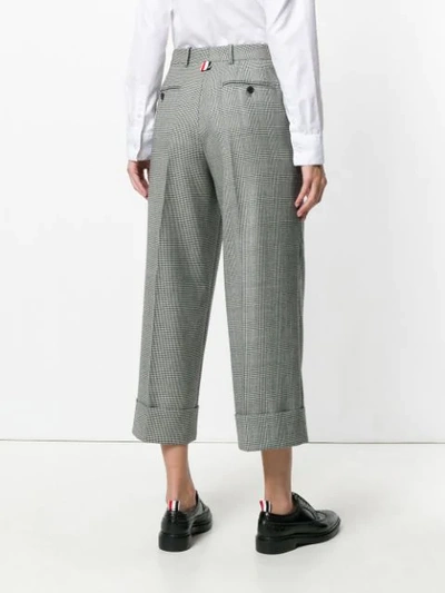 Shop Thom Browne Prince Of Wales Trousers In Black