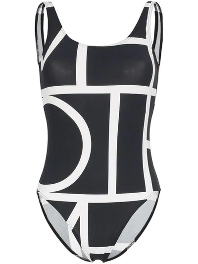 Shop Totême Positano Monogram Print Swimsuit In Black