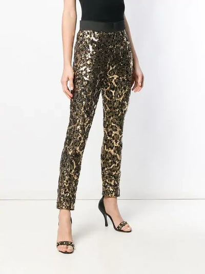 Shop Dolce & Gabbana Leopard Sequin Trousers In Black