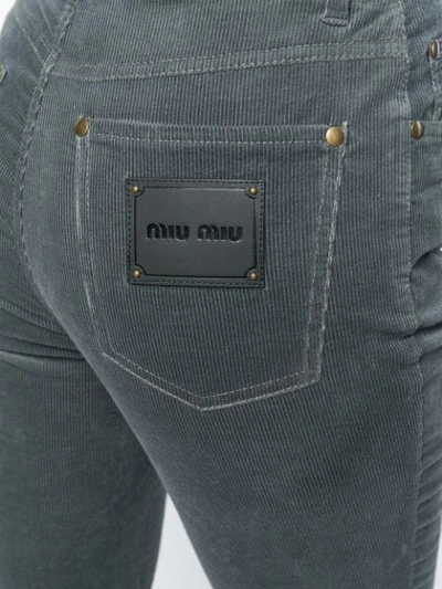 Shop Miu Miu Kick Flare Corduroy Trousers In Grey