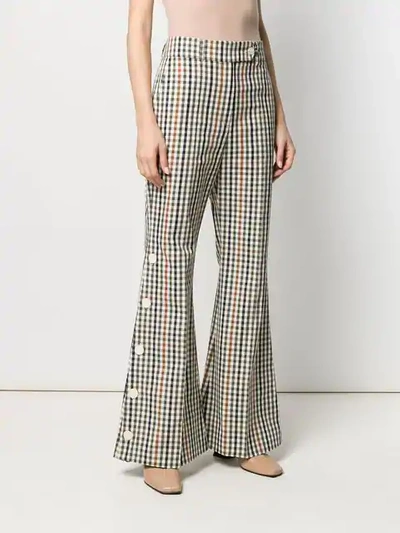 Shop A.w.a.k.e. Gingham Checked Flared Trousers In Neutrals