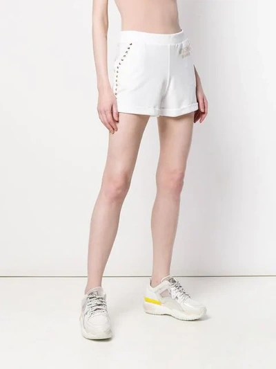Shop Moschino Swim Studded Shorts - White