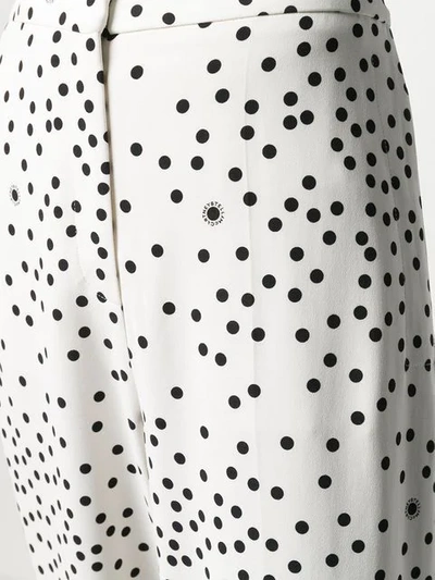 Shop Stella Mccartney Polka Dot Tapered Trousers In White