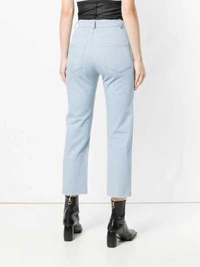 high-waisted trousers