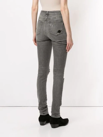Shop Saint Laurent Distressed Skinny Jeans In Grey
