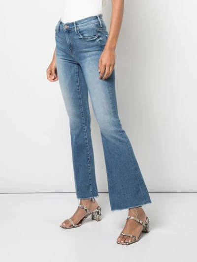 Shop Mother Flared Jeans In Blue