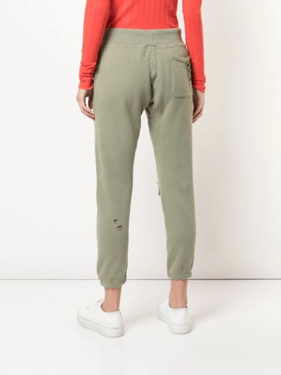 Shop Nsf Sayde Distressed Track Trousers In Green