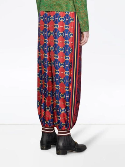 Shop Gucci Contrast Print Silk Track Pants In Red