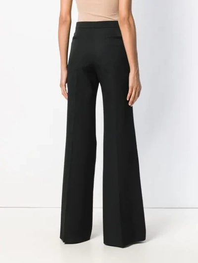 Shop Rochas High Waisted Flared Trousers In Black