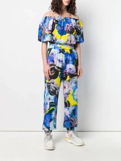 Shop Msgm Floral Print Jumpsuit In Blue