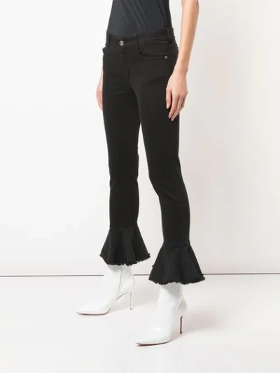 Shop Stella Mccartney Flare Hem Skinny Jeans In Black