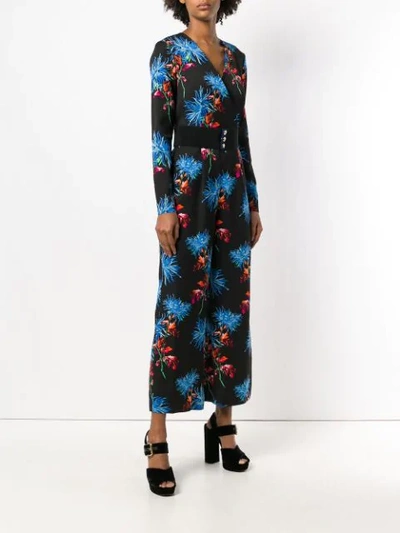 Shop Diane Von Furstenberg Floral Print Jumpsuit In Black