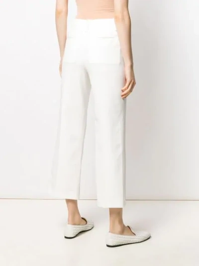 Shop Alysi Twill Kick Flare Trousers In White