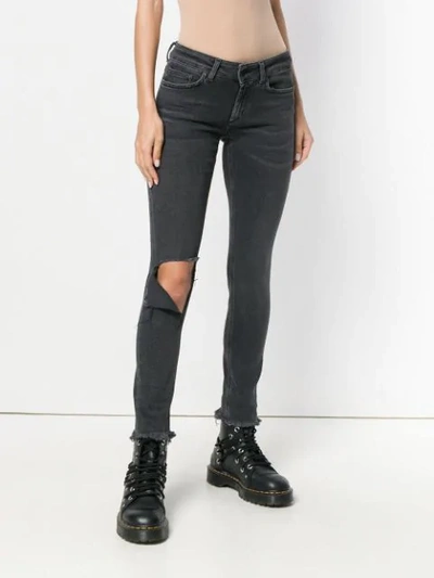 Shop Dondup Ripped Knee Jeans In Black