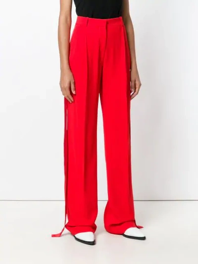 Shop Givenchy Side Stripe Tailored Trousers In Red