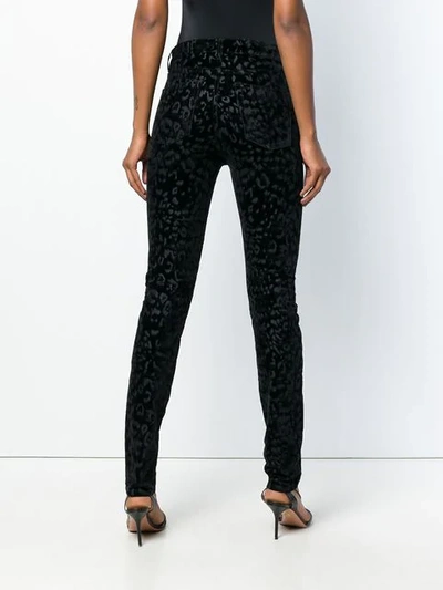 Shop Saint Laurent Leopard-print Skinny Jeans In Black