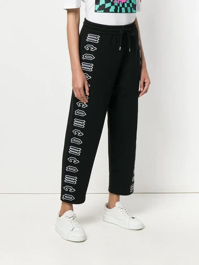 Shop Mcq By Alexander Mcqueen Cropped Repeat Logo Track Pants In Black