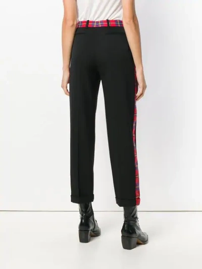 Shop Versace Tartan Trim Trousers In Black