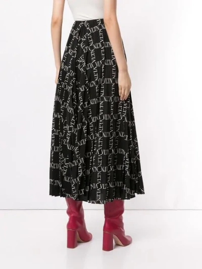 Shop Valentino Vltn Print Skirt In Black