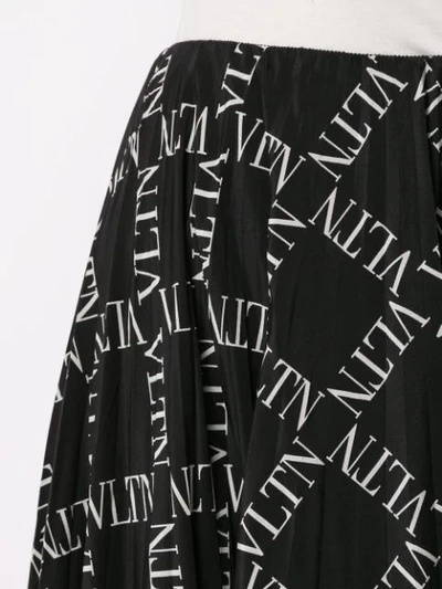 Shop Valentino Vltn Print Skirt In Black