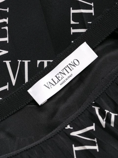 Shop Valentino Vltn Print Skirt In Black