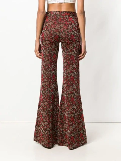 Shop Chloé Swirl Print Kick Flare Trousers In Red