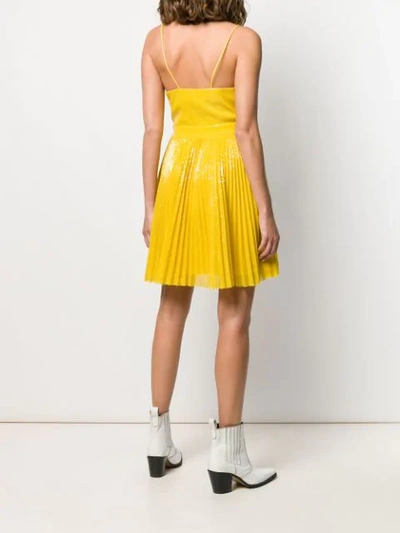Shop Msgm Short Pleated Dress In Yellow