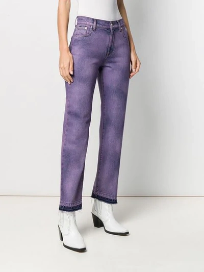 Shop Msgm Faded Patch Jeans In Purple