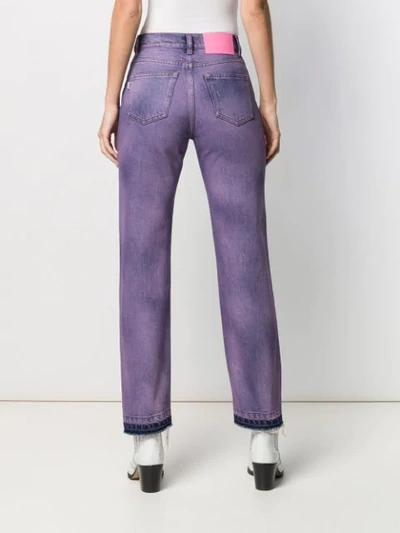 Shop Msgm Faded Patch Jeans In Purple