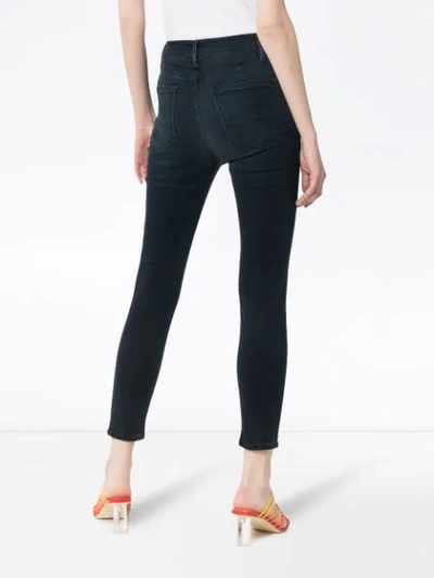 Shop Frame Ali High-rise Skinny Cigarette Jeans In Blue