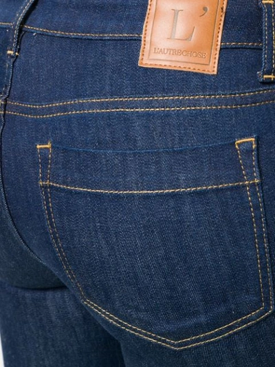Shop L'autre Chose Flared Low-rise Jeans In Blue
