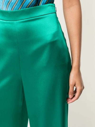 Shop Cushnie Satin Flare Trousers In Green