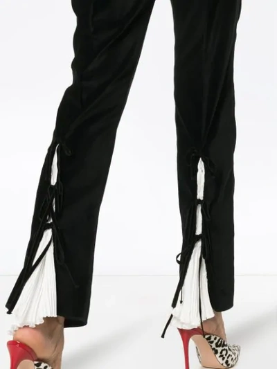 Shop Rosie Assoulin Split Hem Cotton Trousers In Black