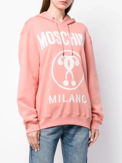 Shop Moschino Logo Print Hoodie - Pink
