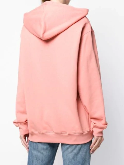 Shop Moschino Logo Print Hoodie - Pink