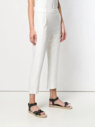 Shop Ann Demeulemeester Ripped Detail Cropped Trousers In White