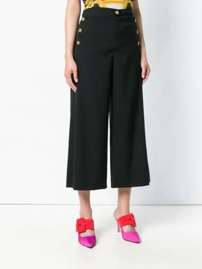 Shop Versace Button Embellished Culottes In Black