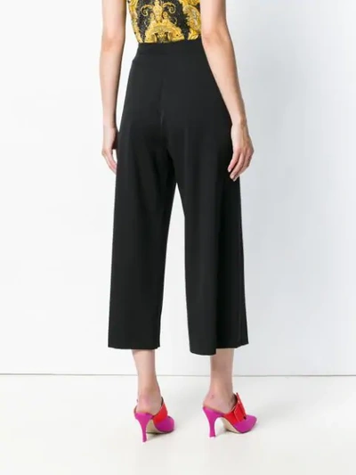 Shop Versace Button Embellished Culottes In Black