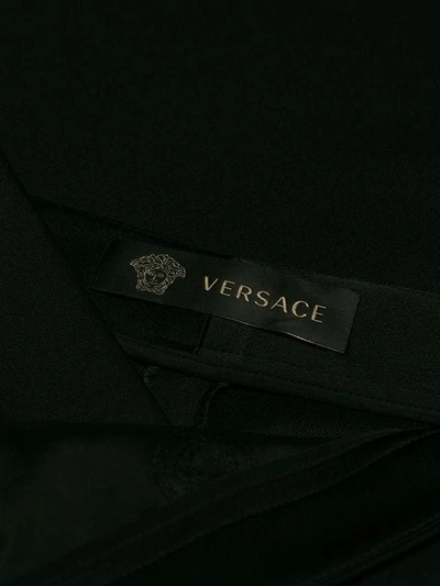 Shop Versace Button Embellished Culottes In Black