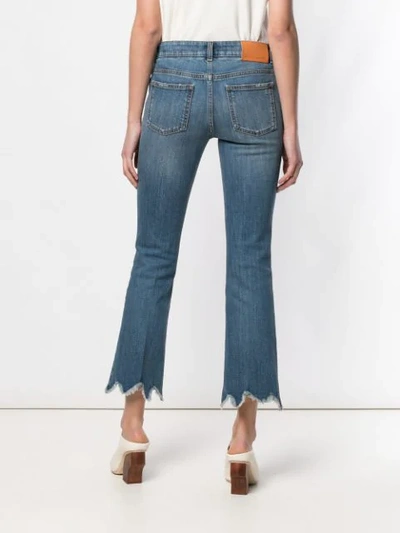 Shop Stella Mccartney Cropped Flare Jeans In Blue