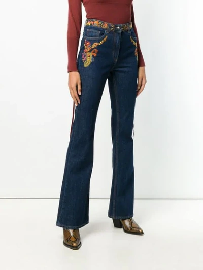 Shop Etro Embroided Flared Jeans - Blue