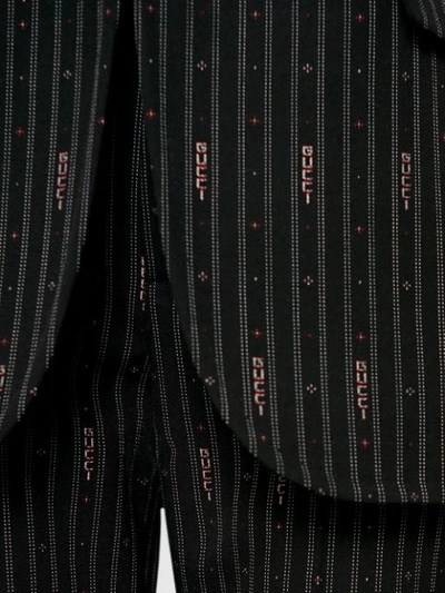 Shop Gucci Stripe Fil Coupé Wool Pants In Black