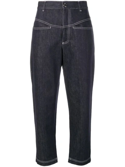 Shop Fendi Cropped Tapered Jeans In Blue