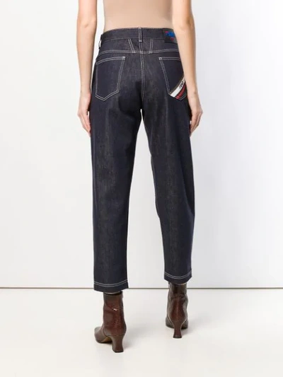 Shop Fendi Cropped Tapered Jeans In Blue