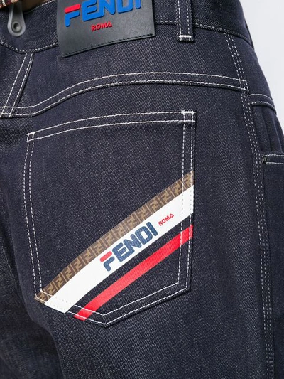 Shop Fendi Cropped Tapered Jeans In Blue