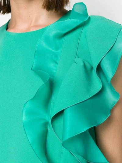 Shop Genny Ruffled Sleeveless Blouse In Green