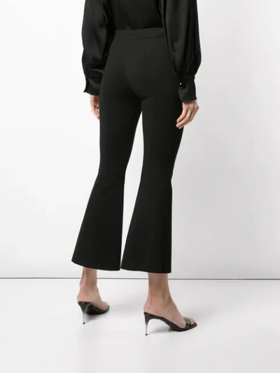 Shop Rosetta Getty Crop Flared Trousers In Black