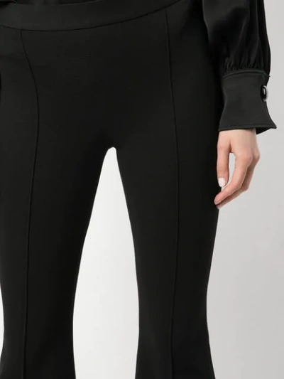 Shop Rosetta Getty Crop Flared Trousers In Black