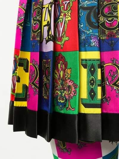 Shop Versace Logo Print Pleated Mini Skirt In A7000 Multicolor