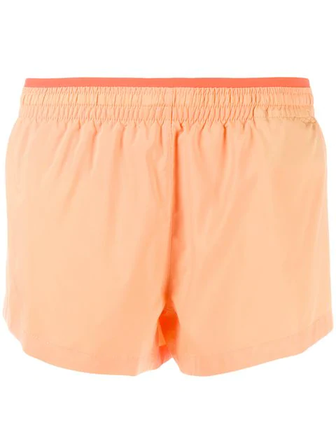 orange nike running shorts